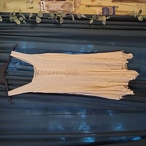 Short cream-colored festival dress with flared skirt.   Size small